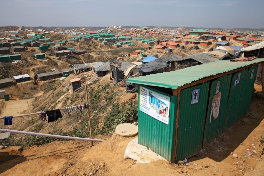 A sprawling Rohingya refugee camp in Bangladesh, stretching farther than the eye can see. Photography by Touhital Islam