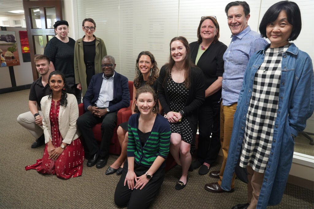 Staff photo with Dr. Denis Mukwege.